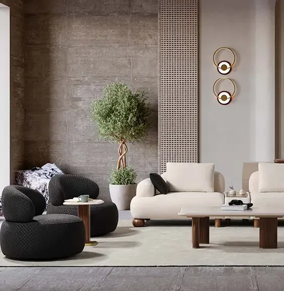 Sitzgruppe aus crèmefarbener Couch und grauen Sesseln von D-Lux